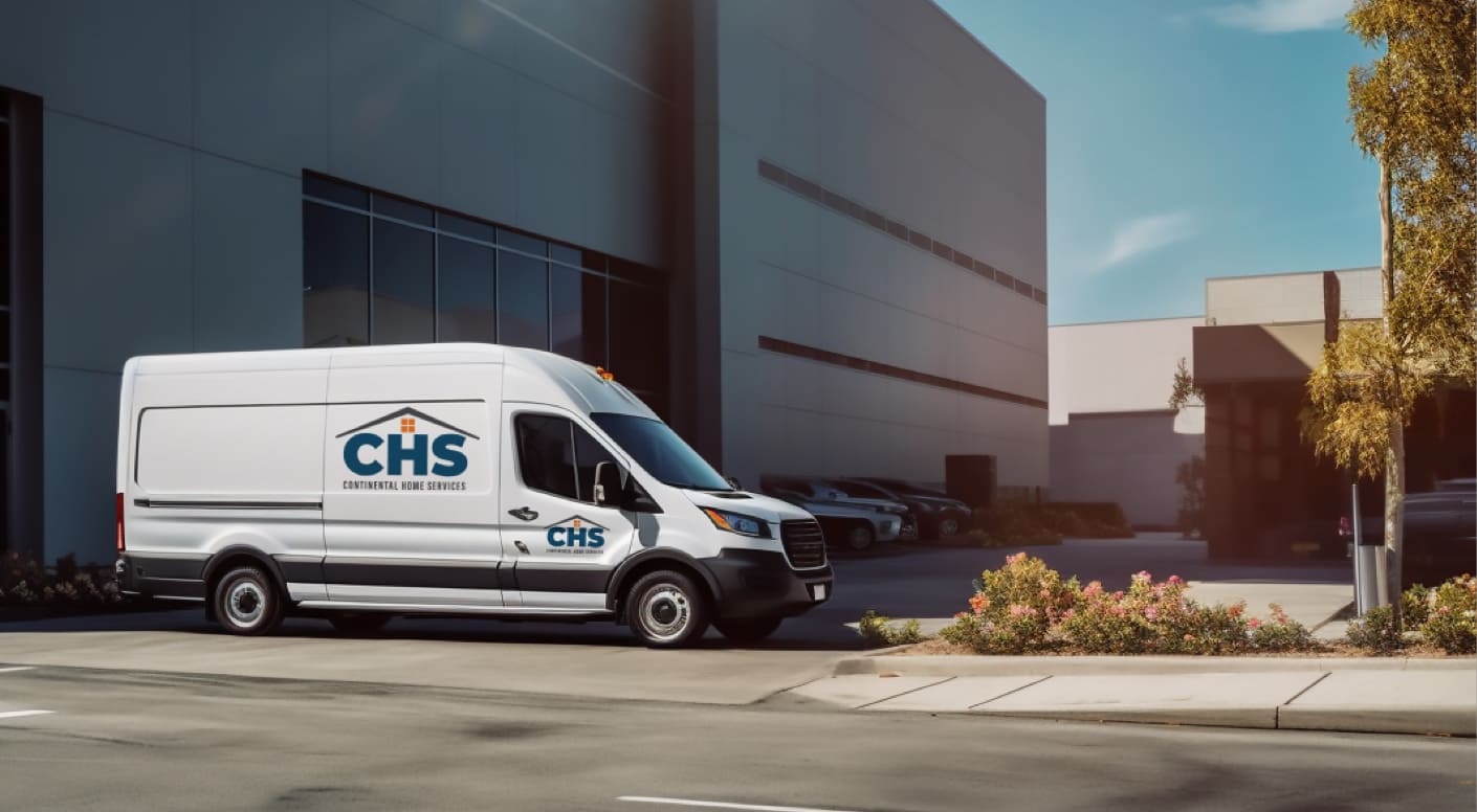 CHS truck in parking lot.